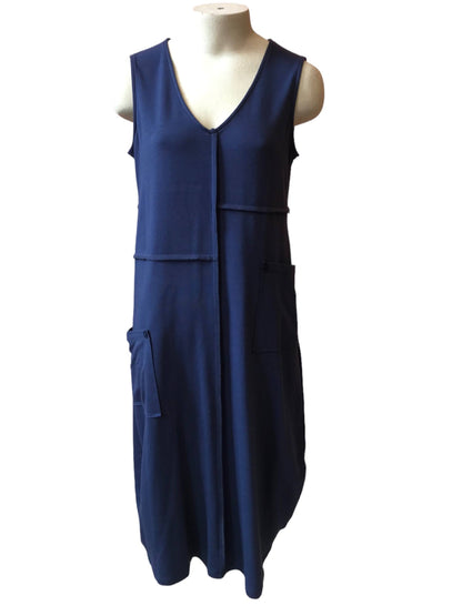 Wanda Dress by Pure Essence, Denim, V-neck, sleeveless, vertical seams, asymmetrical horizontal seams, patch pockets, rounded hem, mid-calf length, eco-fabric, bamboo rayon, cotton, sizes XS to XXL, made in Canada