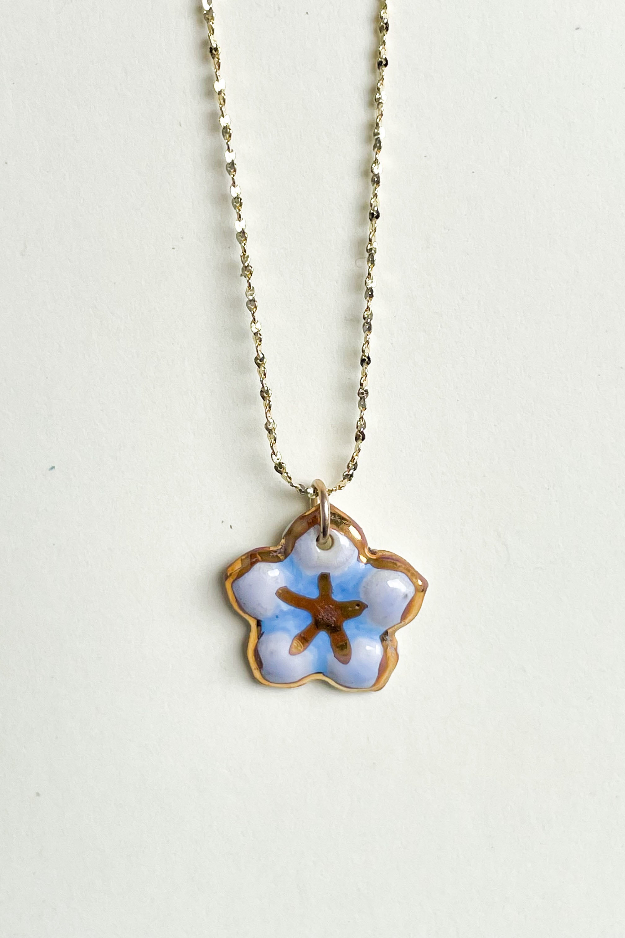 Gold and Periwinkle Flower Pendant