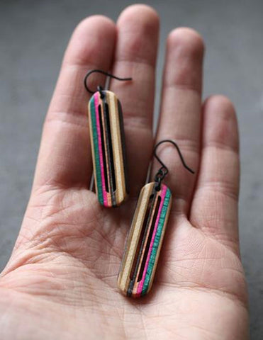 Pier dangle earrings made from repurposed skateboards